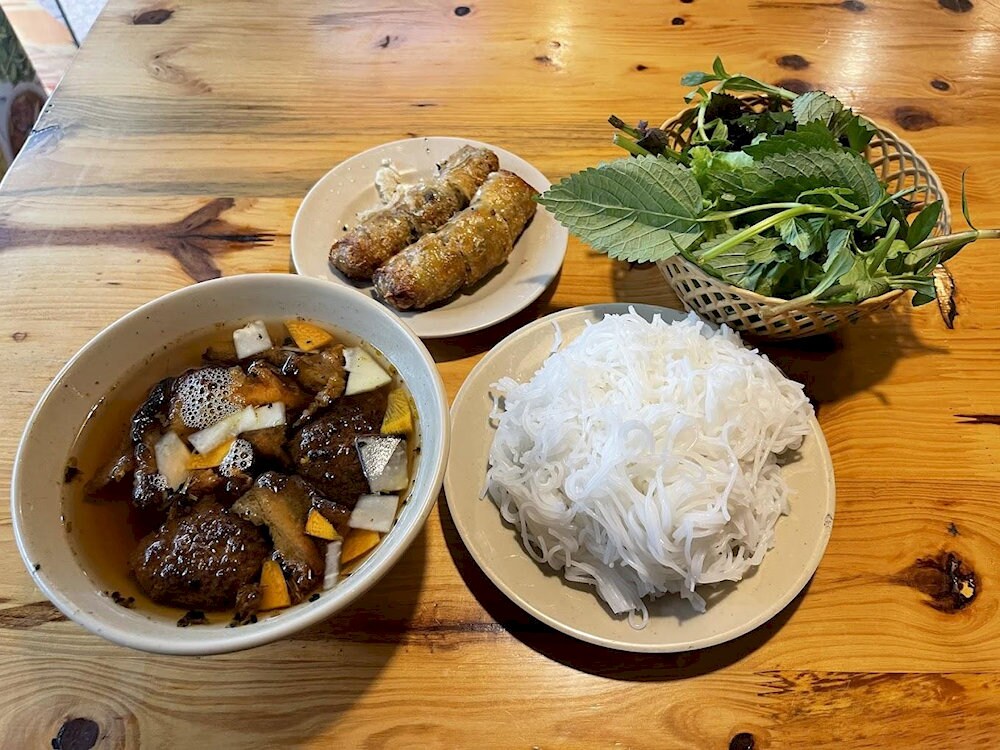 Bun Cha Ta on Nguyen Huu Huan Street serves authentic Hanoi flavors
